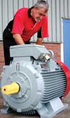 Cliff Brookes, Fenner Motoline product manager, BMG Drives, inspects a new 110&#160;kW EFF1 electric motor